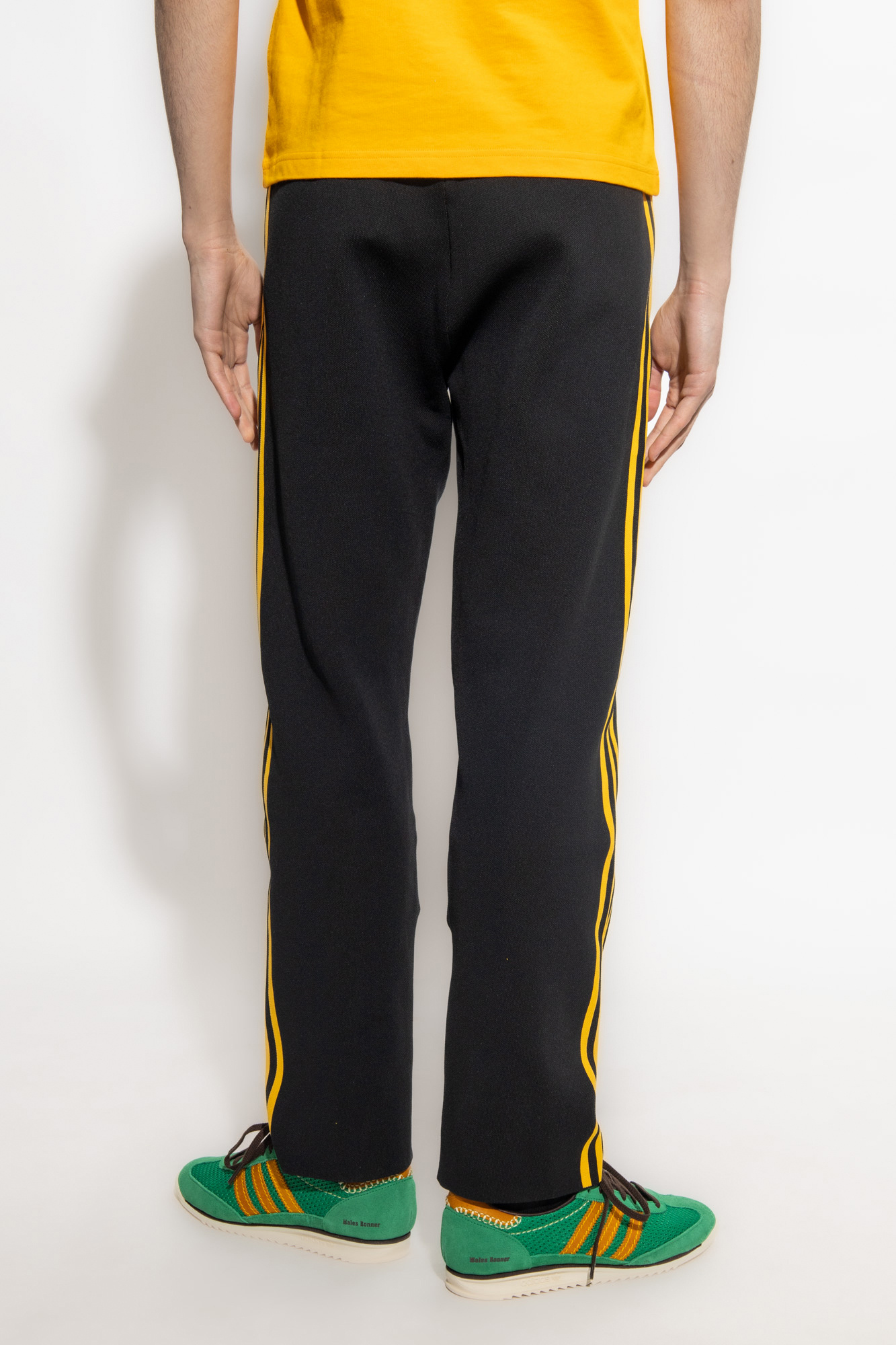 Yellow and black adidas 2025 pants